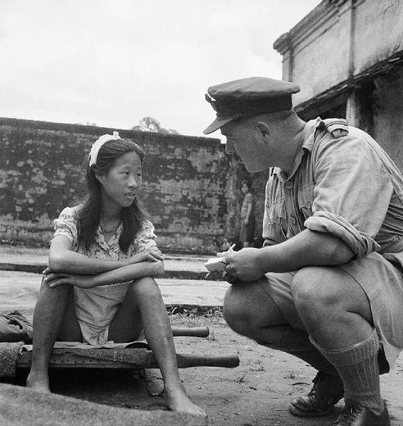 RAF Officer with Comfort Woman, Rangoon, Burma, August 1945