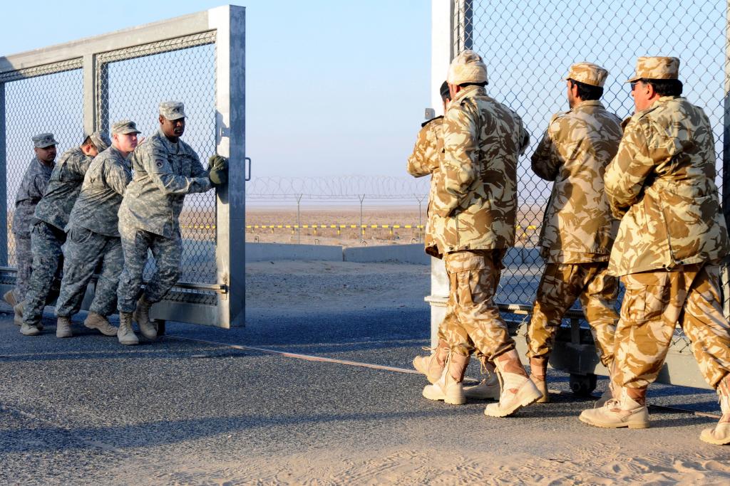 Last Military Convoy Exits Iraq, Kuwaiti Border, December 2011