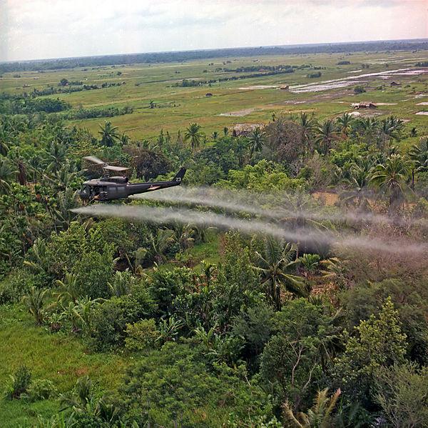 US Helicopter Sprays Defoliation Agent Over Mekong Delta, South Vietnam, July, 1969