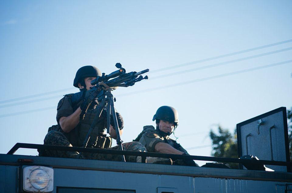 Police Sniper Atop SWAT Van, Ferguson MO, Aug. 2014