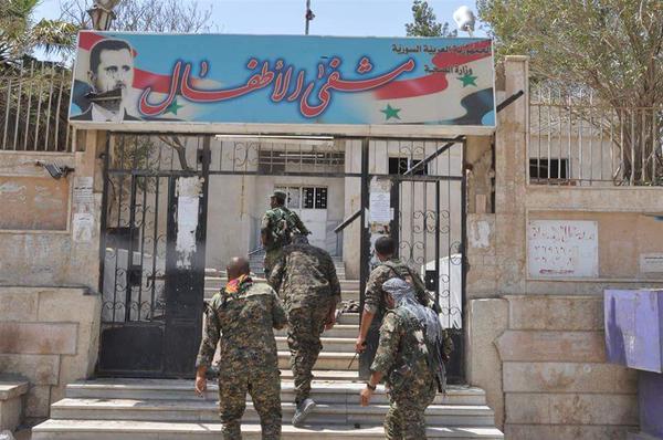 Kurdish Fighters Enter the Abandoned Children's Hospital; Al-Hasakah, July 2015