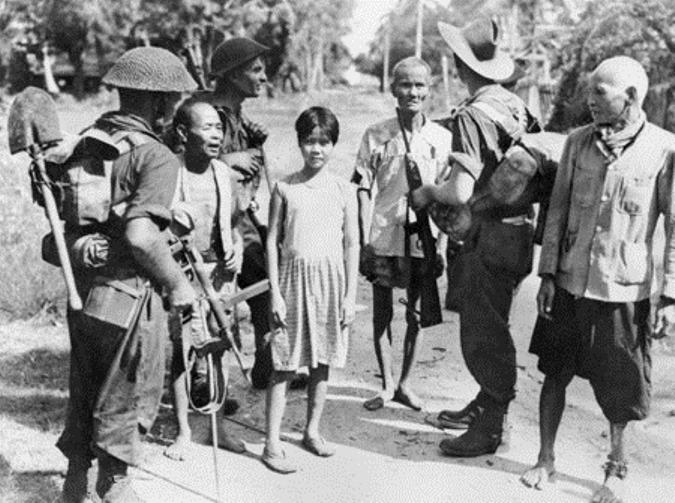Australian Soldiers Meet Civilians on Labuan (Malaysia); WWII; June 1945