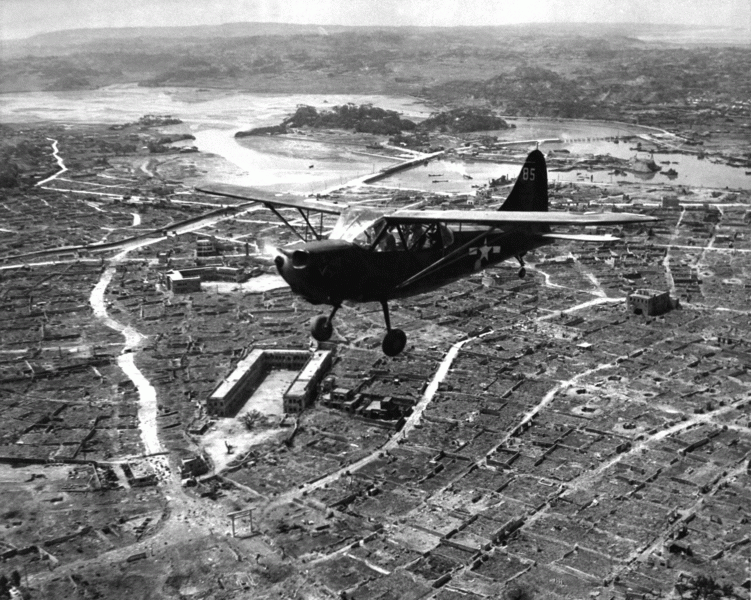 Marine Reconnaissance Plane Over Okinawa, Japan, May 1945