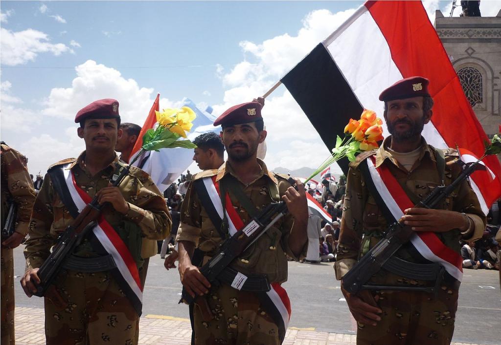 Yemeni Soldiers with Flowers in their Rifles