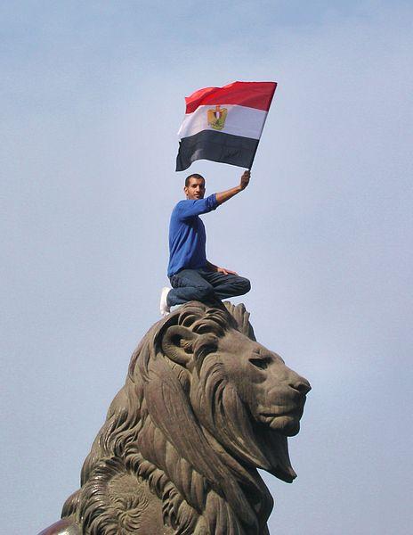 Egyptian Protester Waves Flag in Support of Revolution; Cairo, Egypt Sept 2011