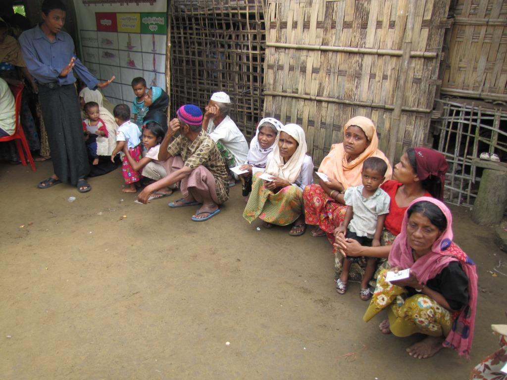 Rohingya Waiting at a Mobile Healthcare Relief Clinic, Myanmar, 2013
