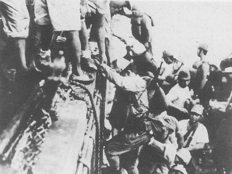 Japanese Troops Boarding "Tokyo Express" Boats Bound for Guadalcanal, Solomon Islands, Late 1942