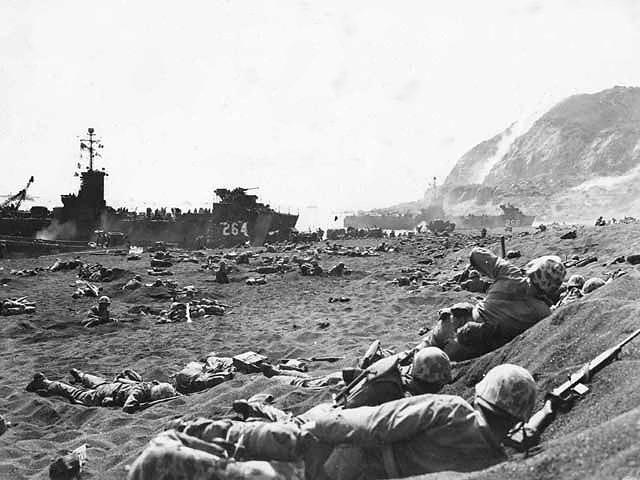 Marines Take Cover on Iwo Jima Beach, Japan, February 1945