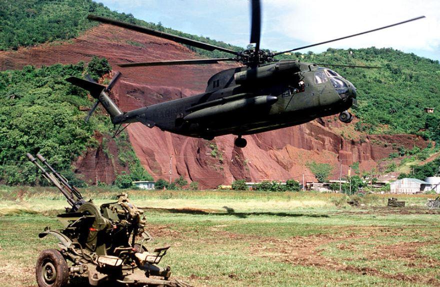 US Marine Chopper Picking Up AA Gun, Grenada, 1983