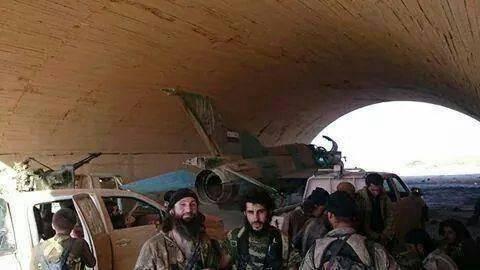 Islamic State Soldiers in front of Captured Aircraft, Al Tabqah Airbase Syria, August 2014