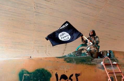 Islamic State Fighter on Captured Plane, Al-Tabqa Airbase Syria, August 2014