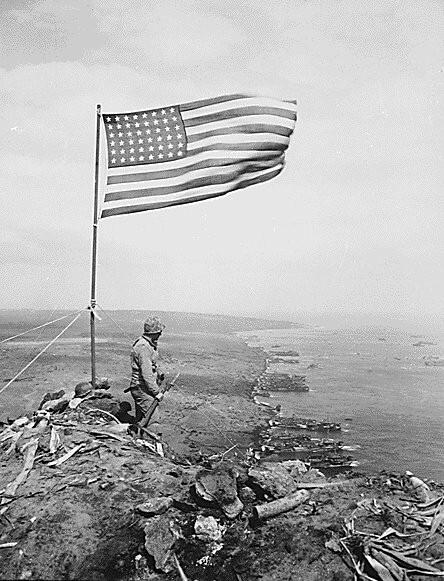 US Flag Flies Over Mount Surabachi, Iwo Jima, Japan, February 1945