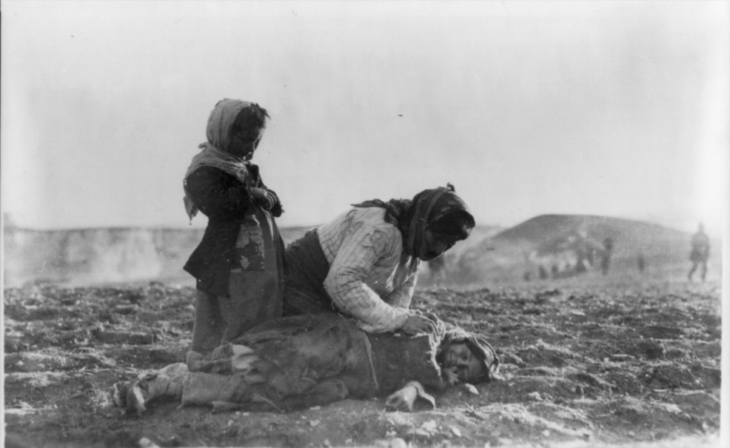 Armenian Woman Kneels Beside Dead Child, Aleppo, Syria, 1915