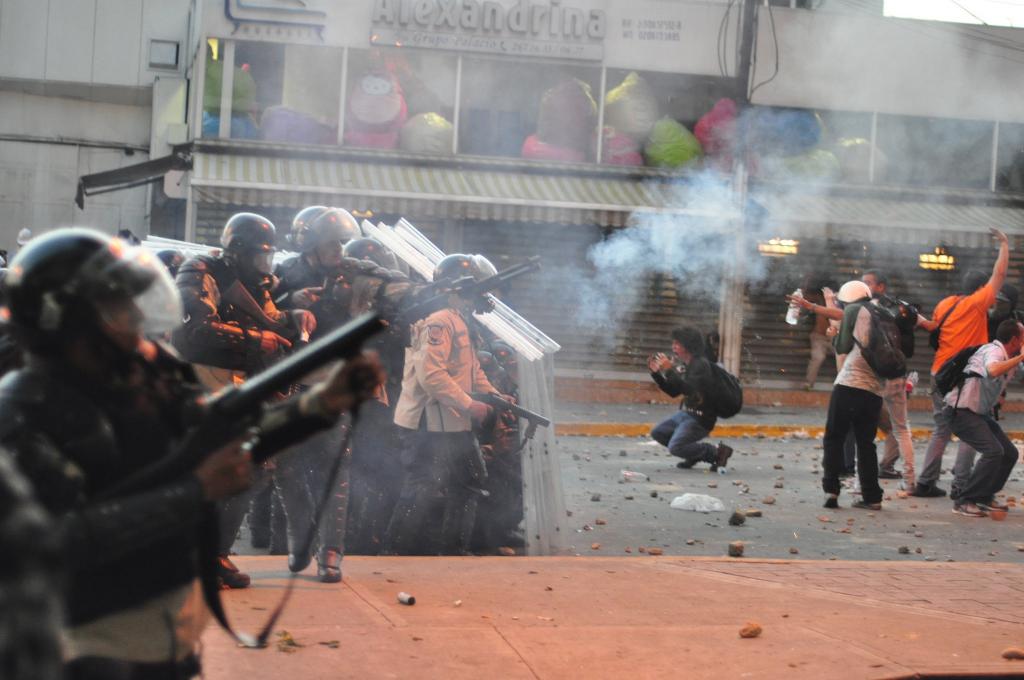 Tear Gas & Plastic Pellets Against a Protest ;Caracas, Venezuela, Feb 2014