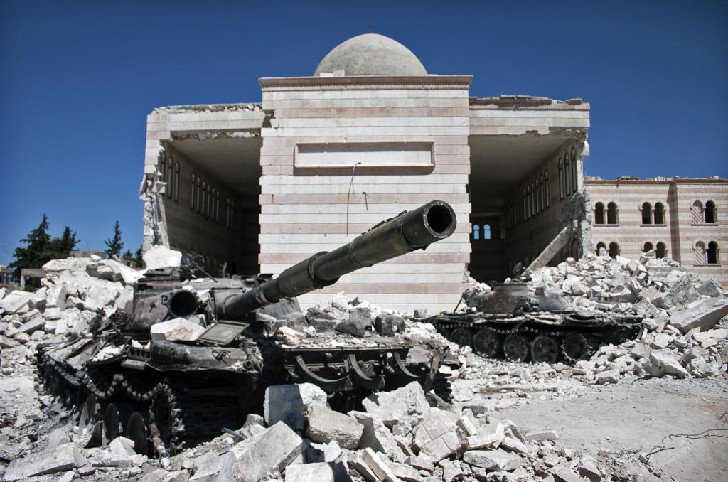 Two destroyed tanks in front of a mosque in Azaz, Syria; Aug 2012