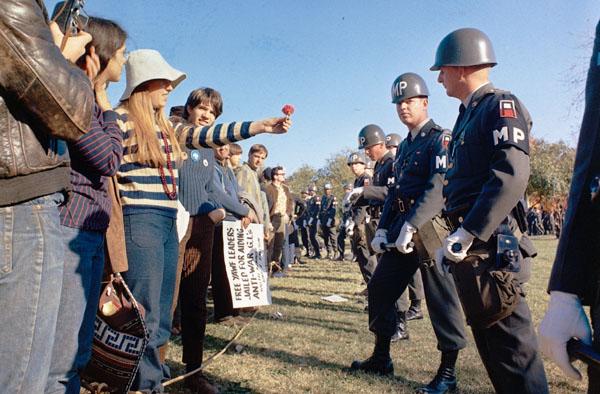 Vietnam War Protester Offers Military Police Officer a Flower, the Pentagon, October, 1967