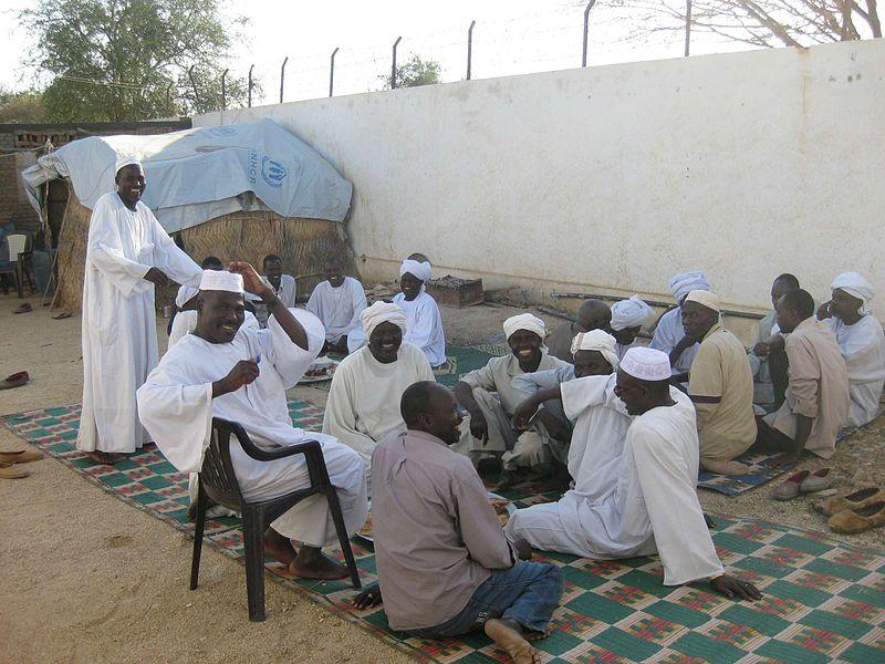 Displaced Men Gathered in Darfur Shelter; Sudan, 2008