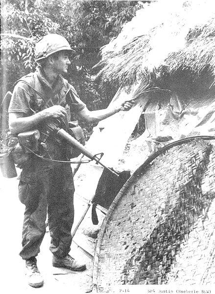US Soldier Sets Fire to Vietnamese Home, My Lai Massacre, South Vietnam, March 16, 1968