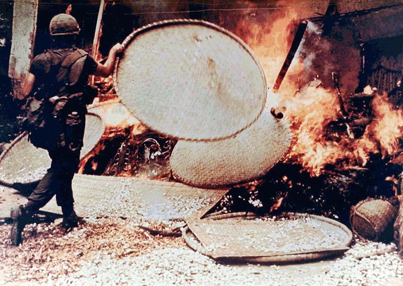 US Soldier Burns Vietnamese Dwelling, My Lai Massacre, South Vietnam, March 16, 1968