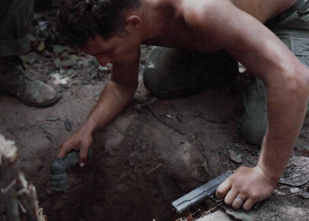 US Soldier Prepares to Enter Viet Cong Tunnel, South Vietnam, January, 1967