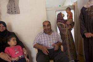 Abdel Rahim smiles as he talks about his grandchildren.